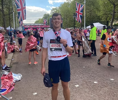 GoPodium co-founder Joel Muir with his London Marathon medal